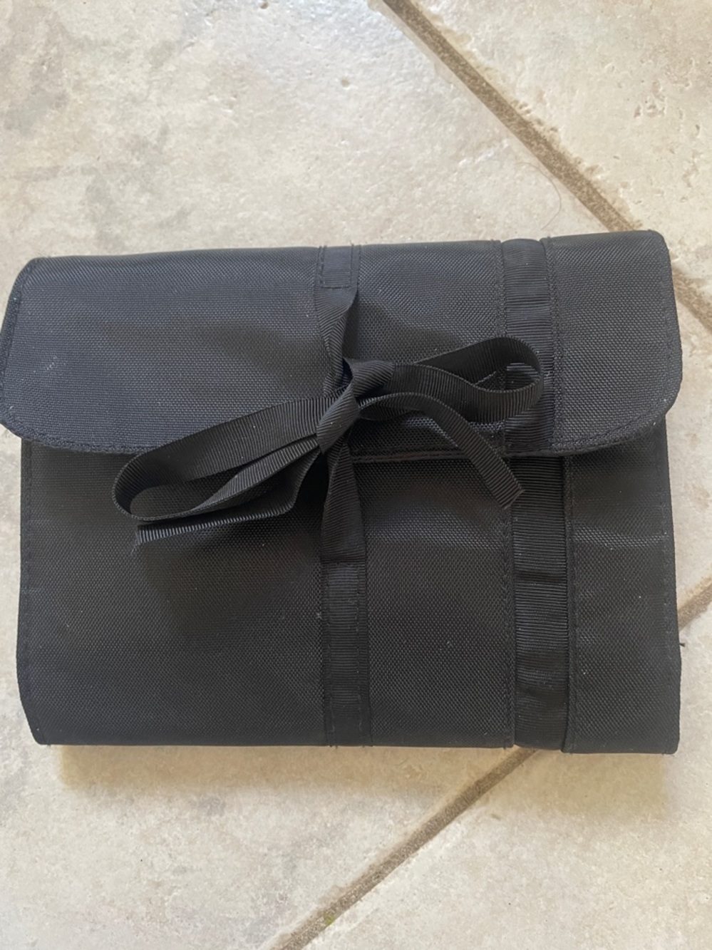 Traveling jewelry pouch with
4 zipper compartments. And 1 Velcro